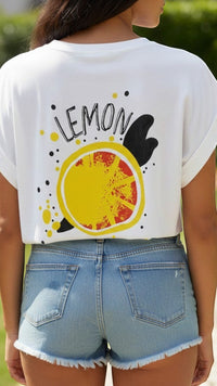 GRINE T-Shirt branca de algodão com elastano, gola redonda e estampa gráfica de limão nas costas.