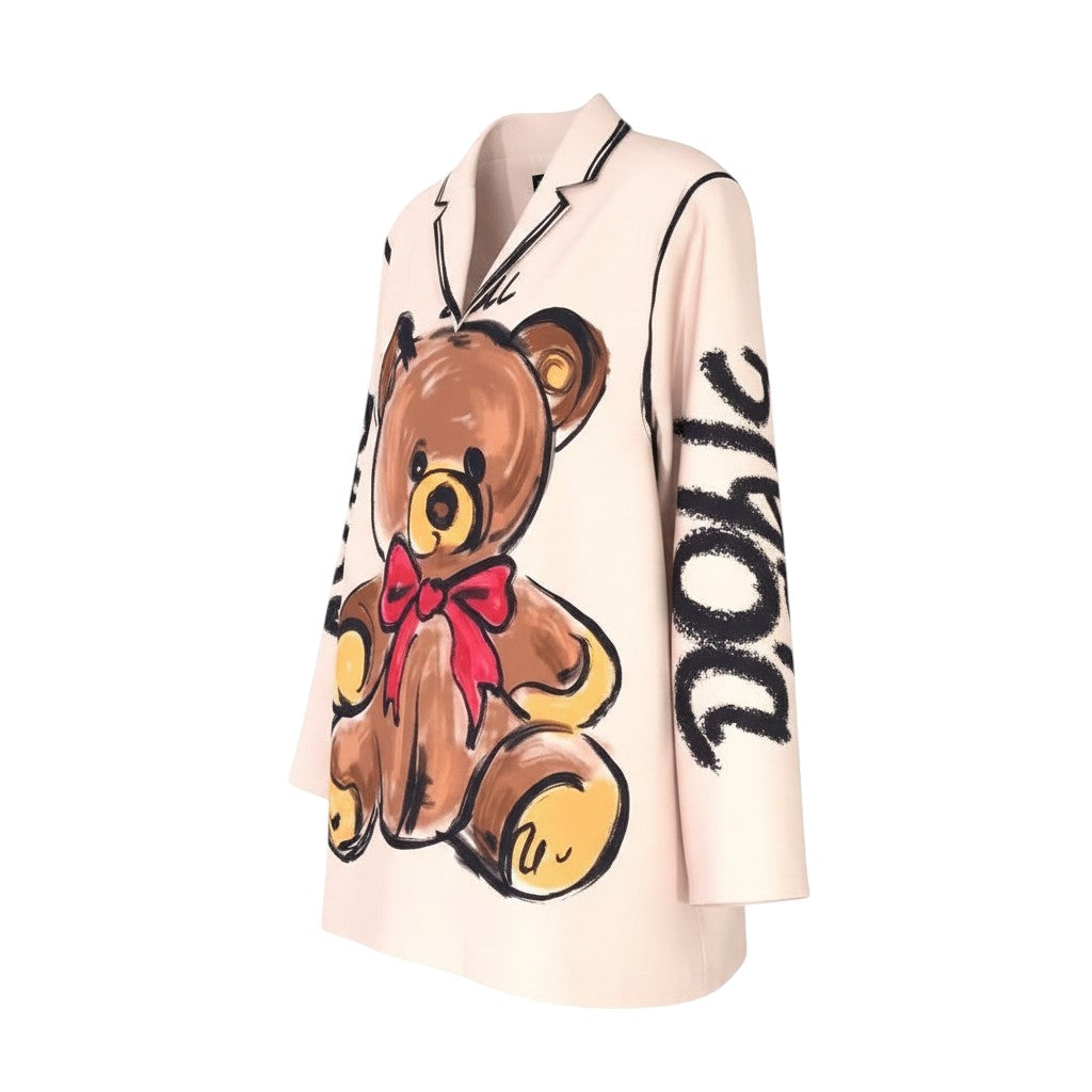 GRINE oversized beige blazer with a large teddy bear graphic and "BABY DOLL" text. Features a red bow.