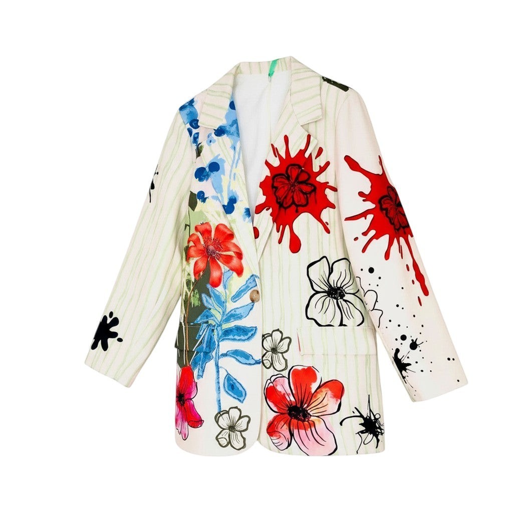 GRINE white/cream long blazer with a vibrant floral print and green pinstripes. Features bold red splatters and abstract flower designs.