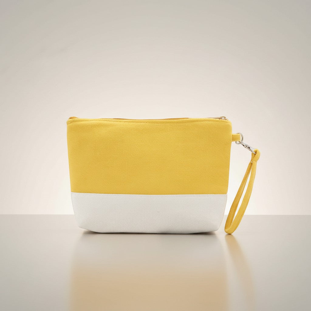 GRINE yellow and white canvas beach necessaire with removable wrist strap. Ideal for makeup and sunscreen.